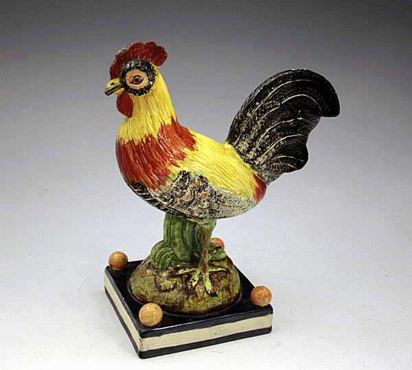 ANTIQUE STAFFORDSHIRE POTTERY FIGURE OF A ROOSTER  C1815