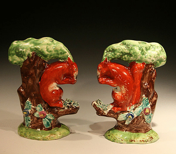 ANTIQUE STAFFORDSHIRE POTTERY FIGURES OF SQUIRRELLS C1820