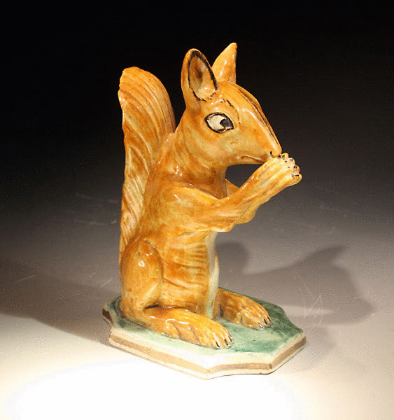 ANTIQUE ENGLISH POTTERY PRATTWARE FIGURE OF A SQUIRRELL