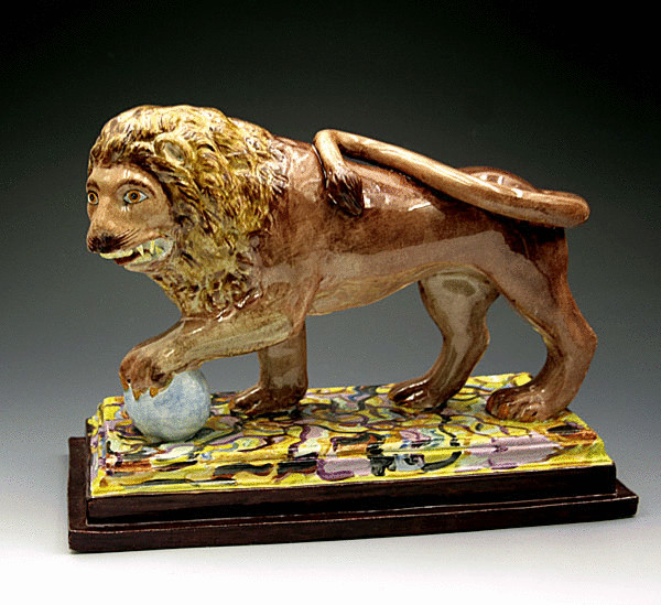 ANTIQUE STAFFORDSHIRE POTTERY PEARLWARE FIGURE OF A LION  c1820      WITH SPECTACULAR BASE