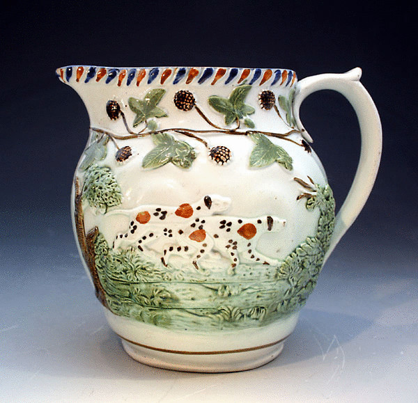 ANTIQUE POTTERY PRATTWARE RELIEF MOULDED PITCHER WITH SPORTING DOGS