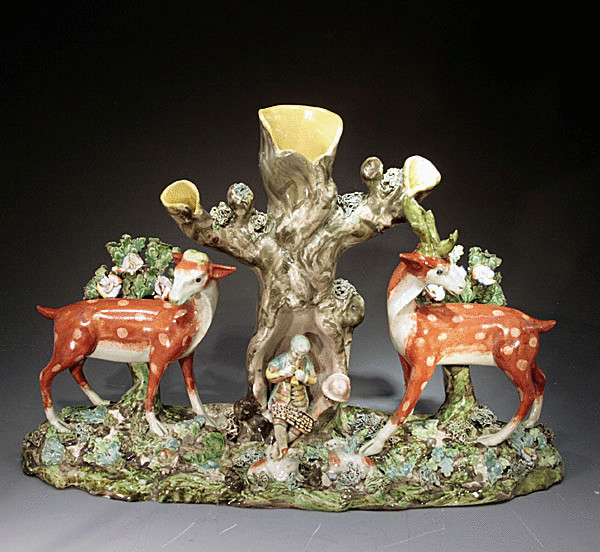 Antique Staffordshire pottery figure group with bocage early 19thc