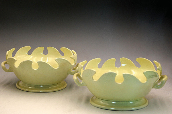 A pair of Castleford plain creamware monteiths from David Dunderdale pottery in Castleford Yorkshire