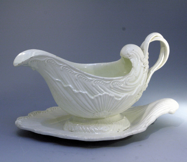 Antique English pottery plain sauce boat and stand c1780