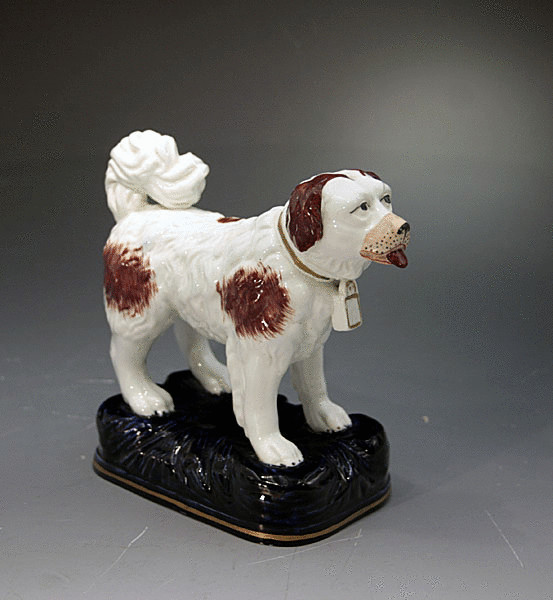 ANTIQUE STAFFORDSHIRE POTTERY FIGURE OF A ST.BERNARD DOG