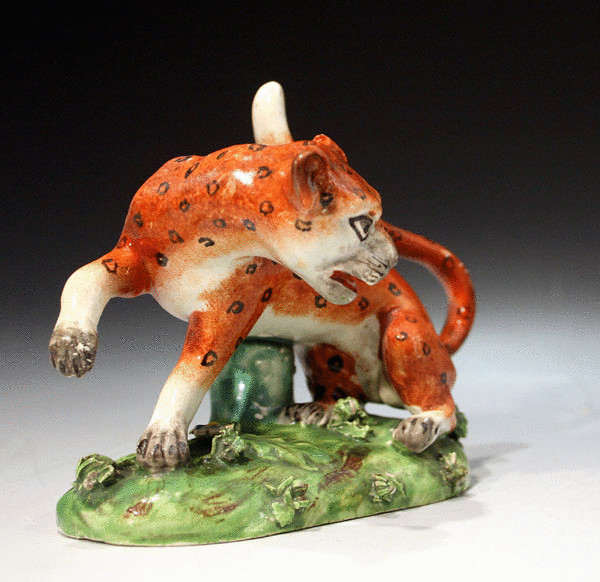 STAFFORDSHIRE POTTERY  FIGURE OF A LEOPARD PEARLWARE