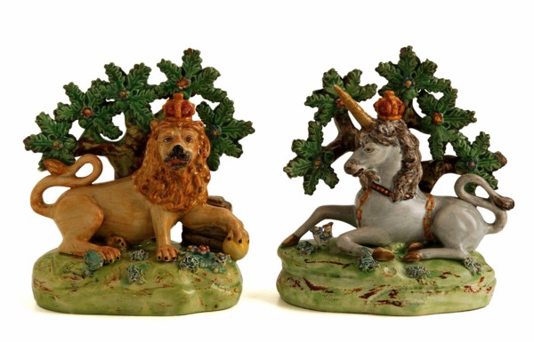 Pair Staffordshire figures in pearlware Lion and Unicorn by Walton.