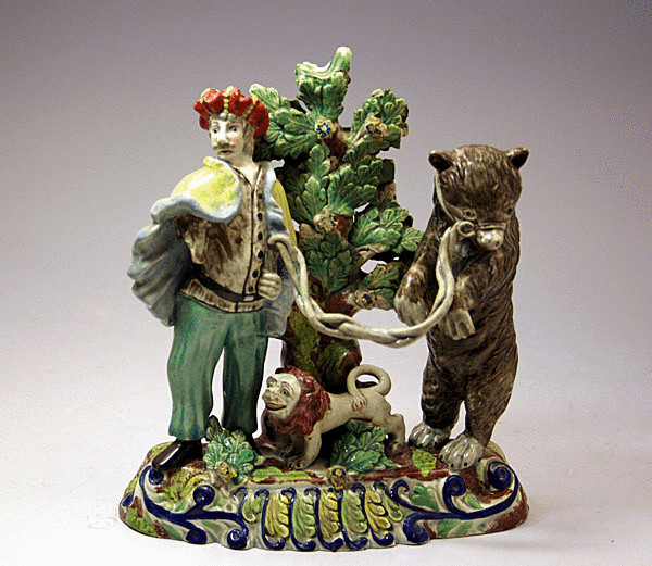Staffordshire figure of Savoyard with performing bear