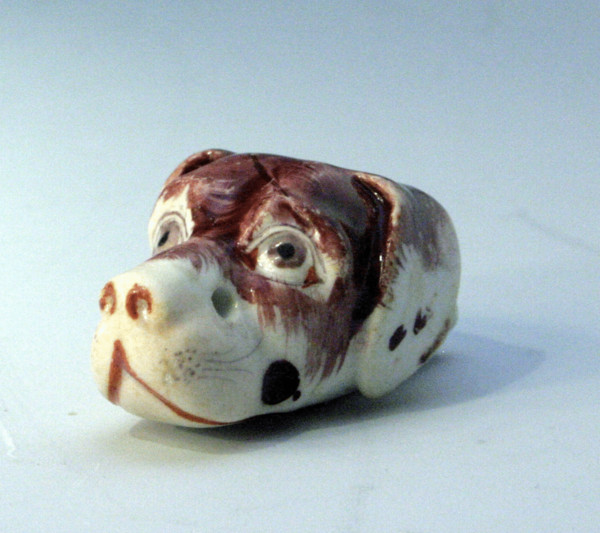 Staffordshire  porcelain dogs head whistle.
