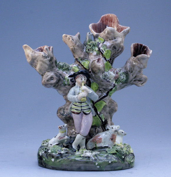 Staffordshire figure of a Piping Shepherd Spill Vase