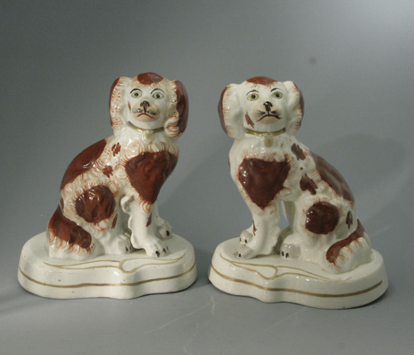 Pair of Staffordshire Spaniel Dogs on bases with best gold decoration