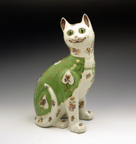 POTTERY FIGURE OF GLASS EYED COMICAL CAT 