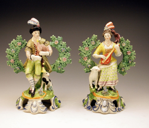 Pair Staffordshire pottery pearlware figures of musicians with bocage
