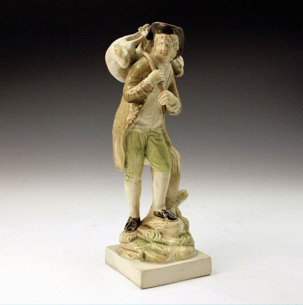 STAFFORDSHIRE POTTERY FIGURE OF 