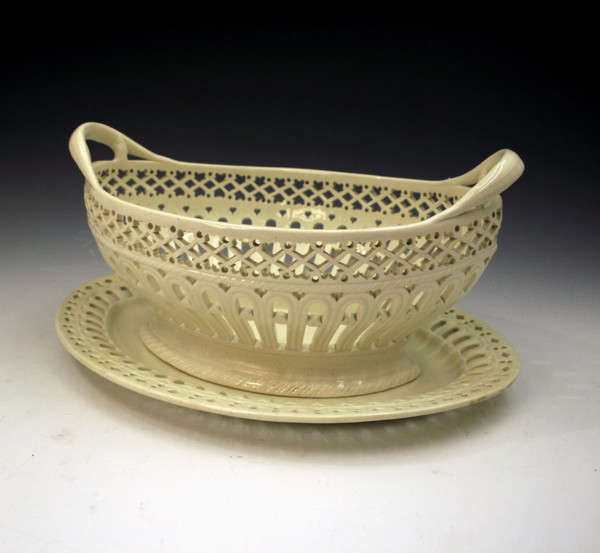 PLAIN CREAMWARE POTTERY BASKET AND STAND SHORTHOSE 