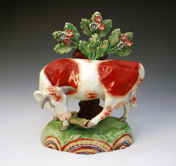 OBADIAH SHERRAT STAFFORDSHIRE FIGURE OF A COW WITH SNAKE. C1820