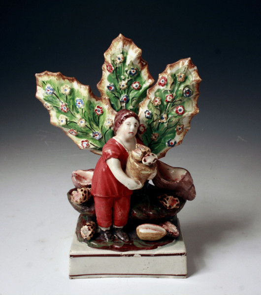 STAFFORDSHIRE POTTERY FIGURE OF SHELL GATHERER C1820