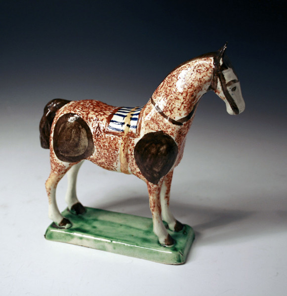 English pottery prattware figure of a standing horse on base 