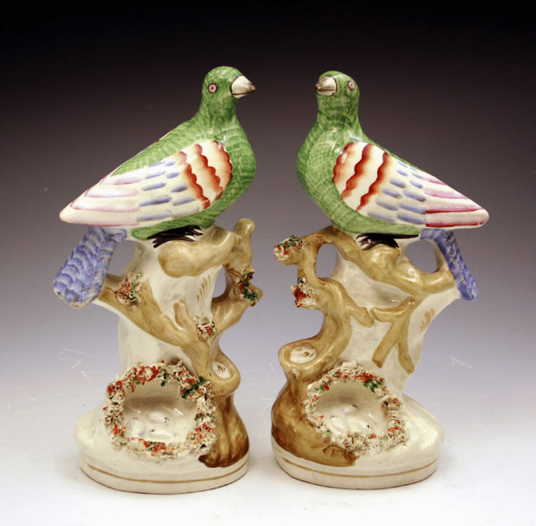 Pair antique Victorian Staffordshire pottery figures of exotic birds