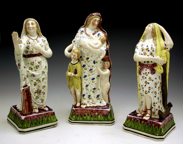 FAITH,HOPE AND CHARITY.STAFFORDSHIRE FIGURES WITH LUSTER DECORATIONON