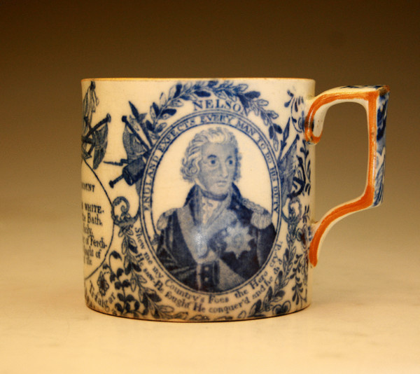 Nelson Commemorative pottery tankard in underglaze blue and white.