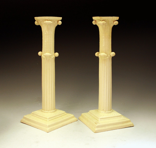 PAIR OF ENGLISH POTTERY CREAMWARE CANDLESTICKS 18THC