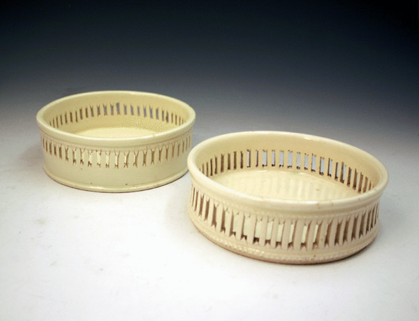 Antique plain creamware pottery wine coasters. late 18thc.