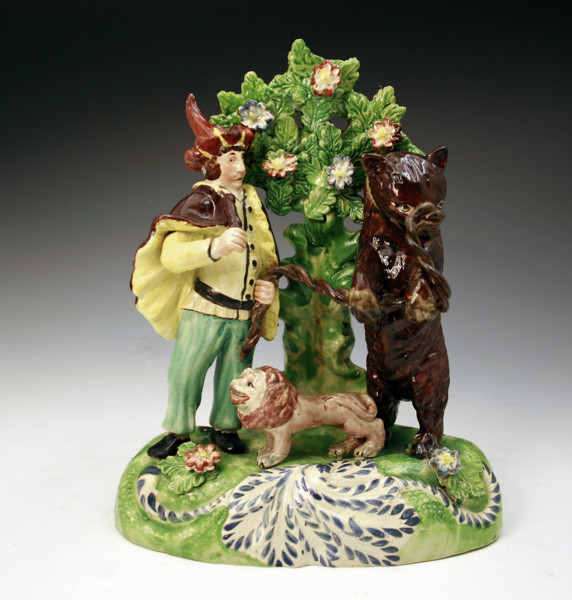 STAFFORDSHIRE POTTERY FIGURE GROUP WITH DANCING BEAR