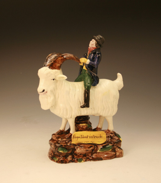SCOTTISH POTTERY PRATTWARE FIGURE OF PAUL PRY ON A GOAT
