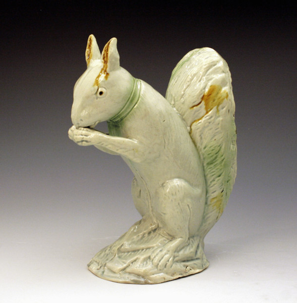 English pottery creamware coloured glazed figure of a Squirrell 18th century