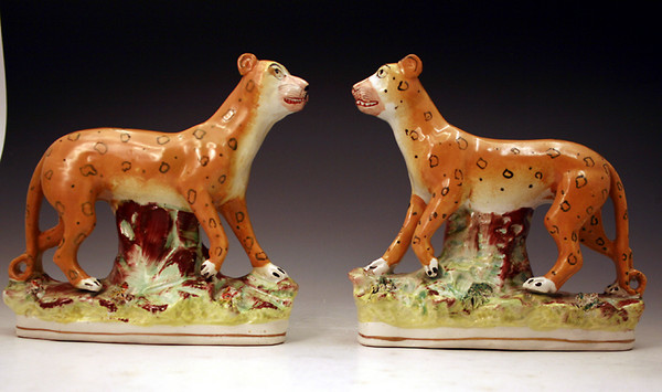 Pair Staffordshire pottery figures of leopards Victorian period