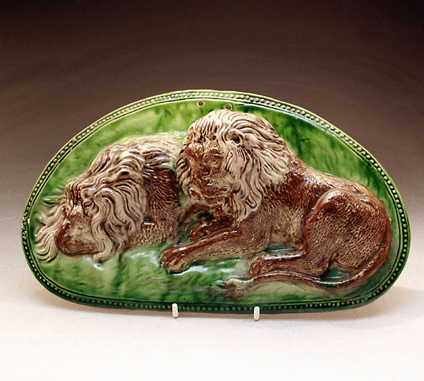 Rare Staffordshire pottery Ralph Wood plaque with figures of two resting lions