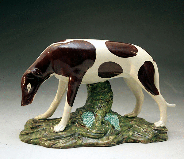 ANTIQUE STAFFORDSHIRE POTTERY PEARLWARE FIGURE OF A DOG