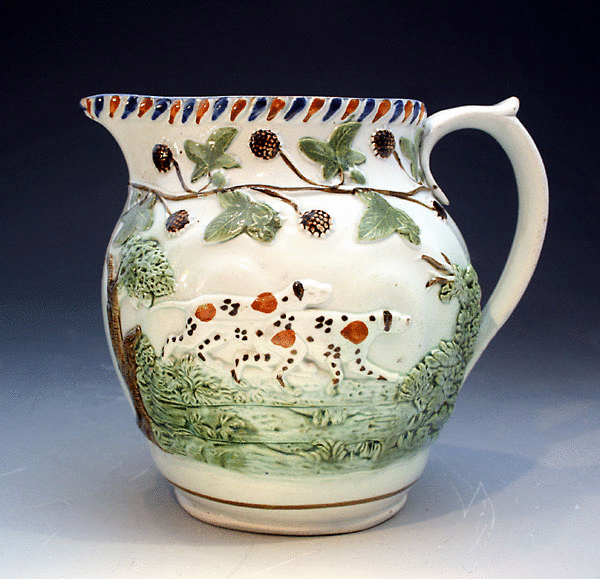 ANTIQUE POTTERY PRATTWARE RELIEF MOULDED PITCHER WITH SPORTING DOGS