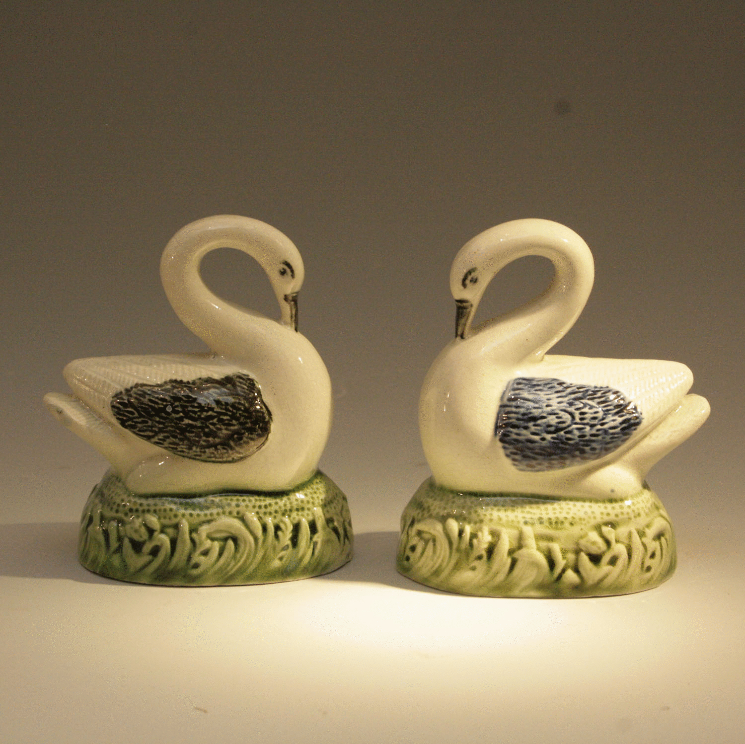 Pair of  English antique pottery Prattware figures of Swans