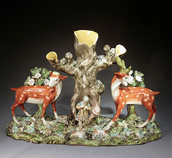 Antique Staffordshire pottery figure group with bocage early 19thc