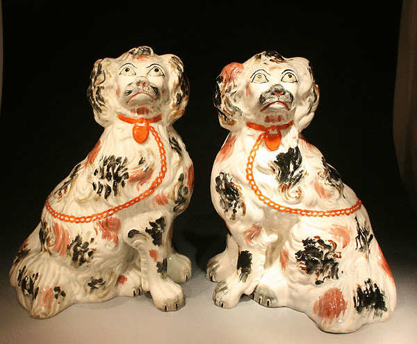 Staffordshire pottery figures of spaniel dogs 
