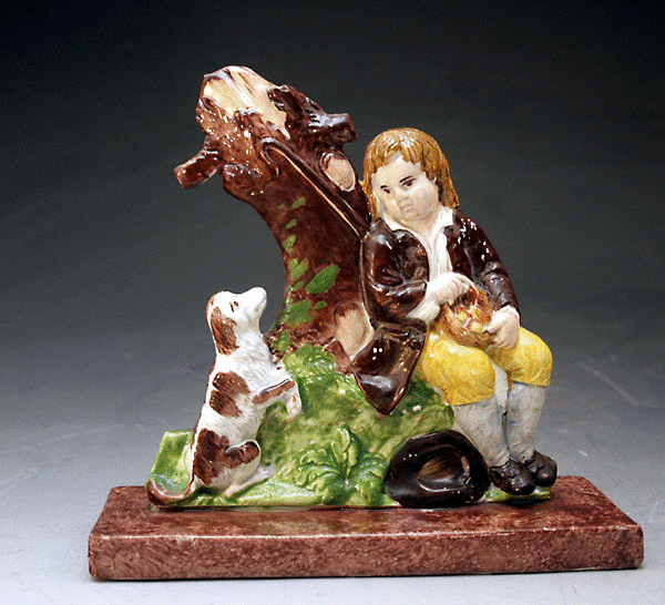 STAFFORDSHIRE FLAT MODELLED OF A BOY IN RURAL SETTING