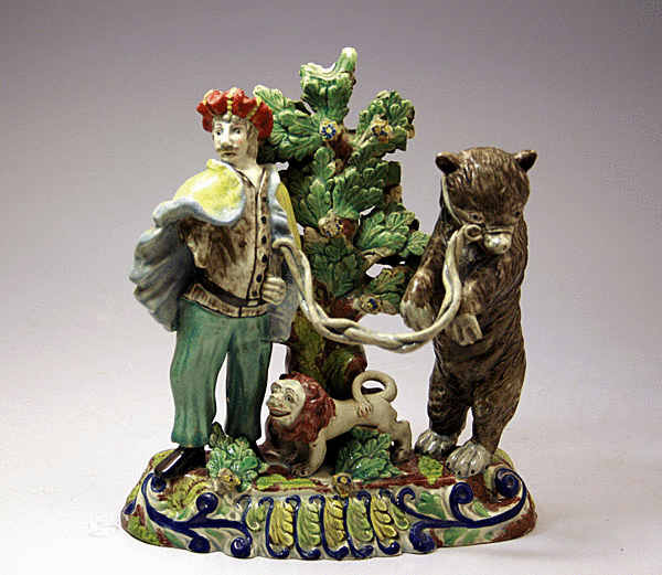 Staffordshire figure of Savoyard with performing bear