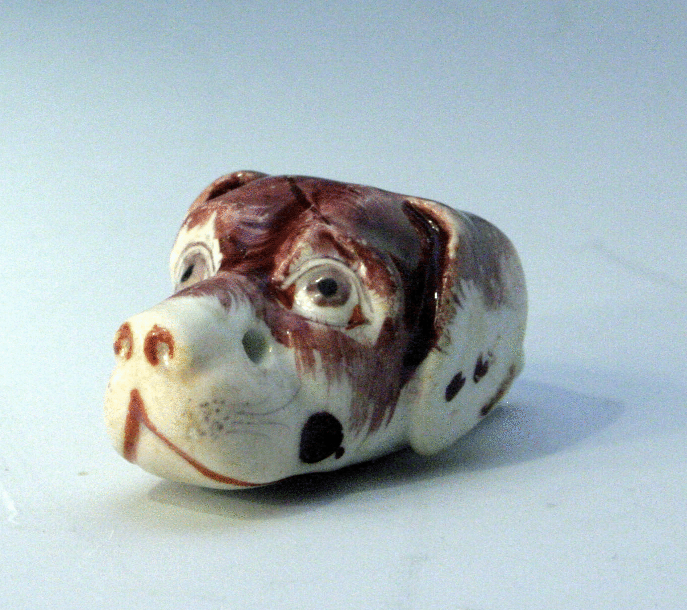 Staffordshire  porcelain dogs head whistle.