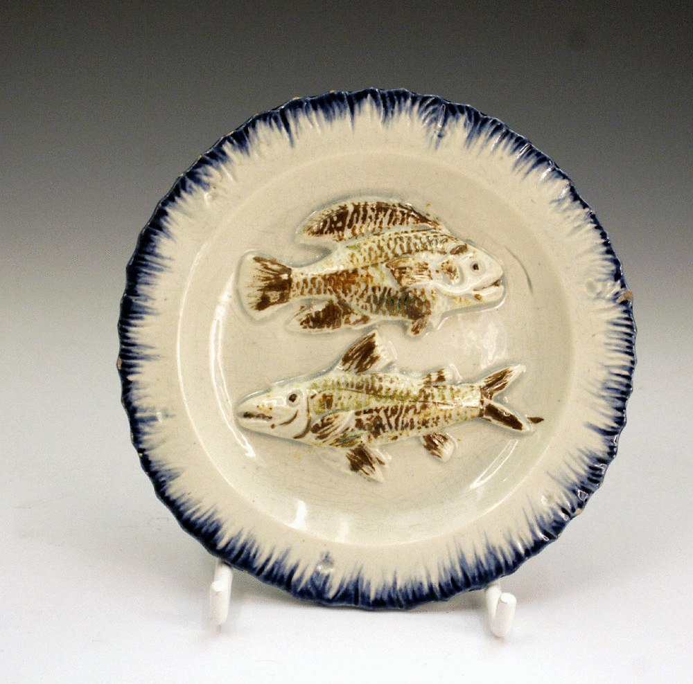 PEARLWARE POTTERY NURSERY TOY PLATE WITH TWO FISH.