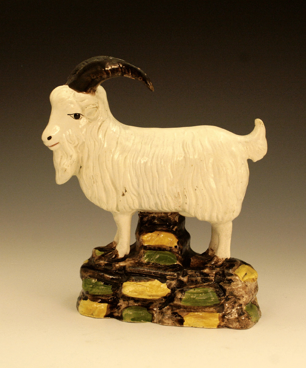 SCOTTISH POTTERY PRATTWARE FIGURE OF A GOAT.