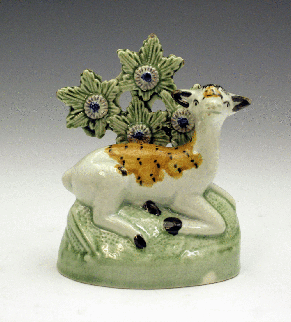 Yorkshire pottery figure of a doe at lodge. c1800