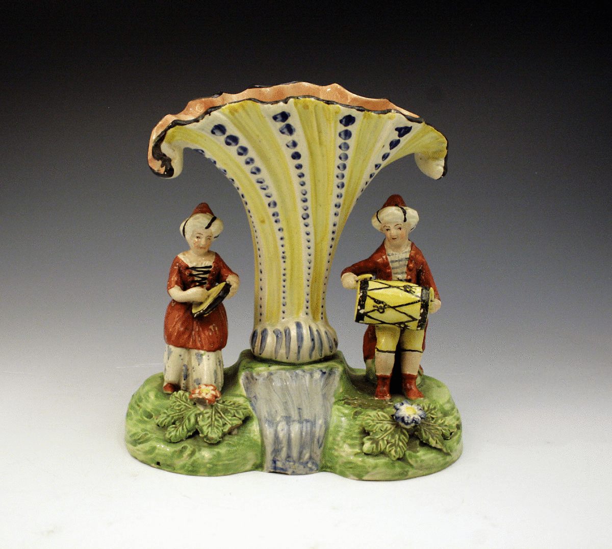 STAFFORDSHIRE FIGURES OF MUSICIANS TRUMPET SHELL GROUP