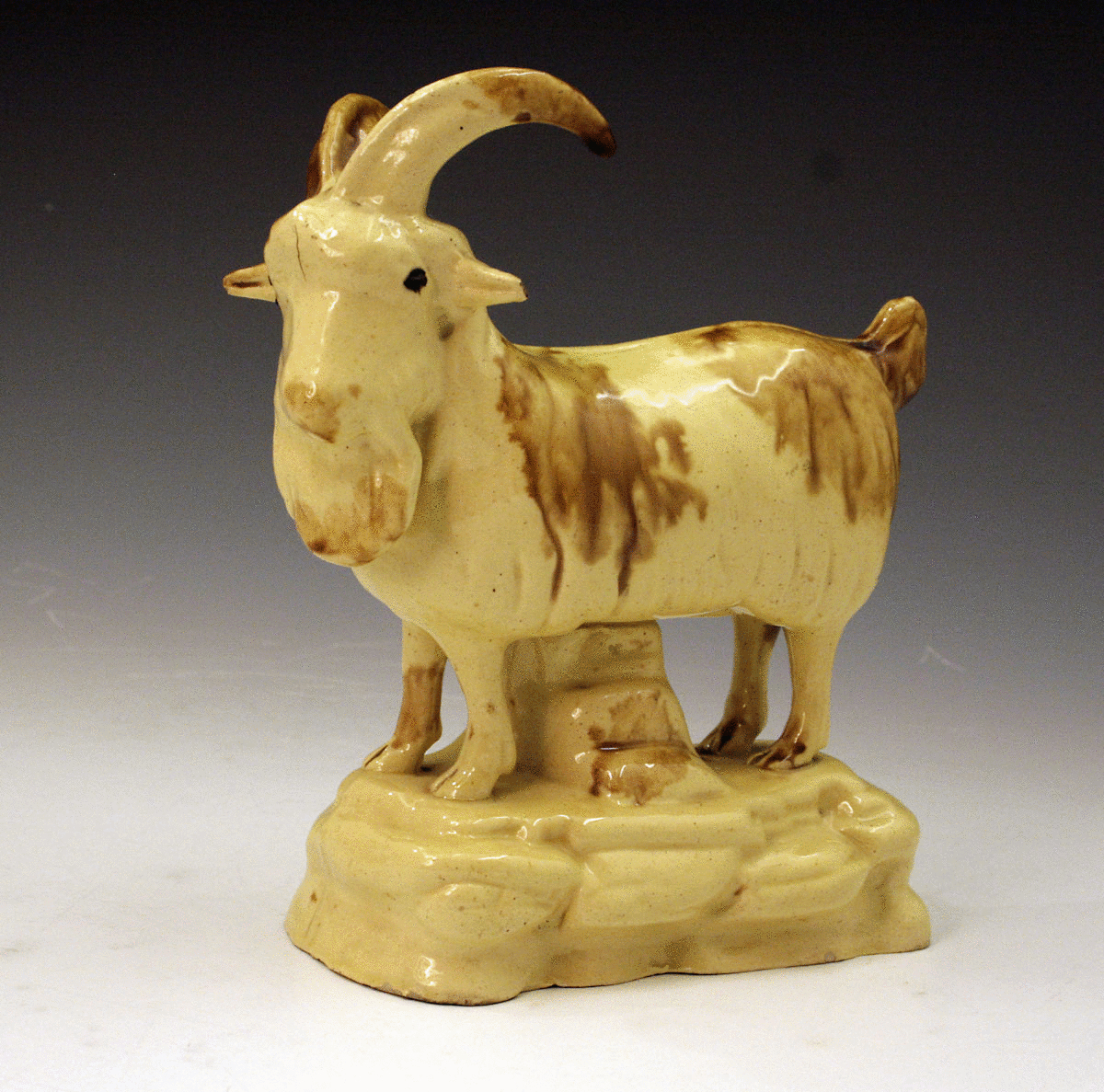 ANTIQUE SCOTTISH POTTERY FIGURE OF A GOAT