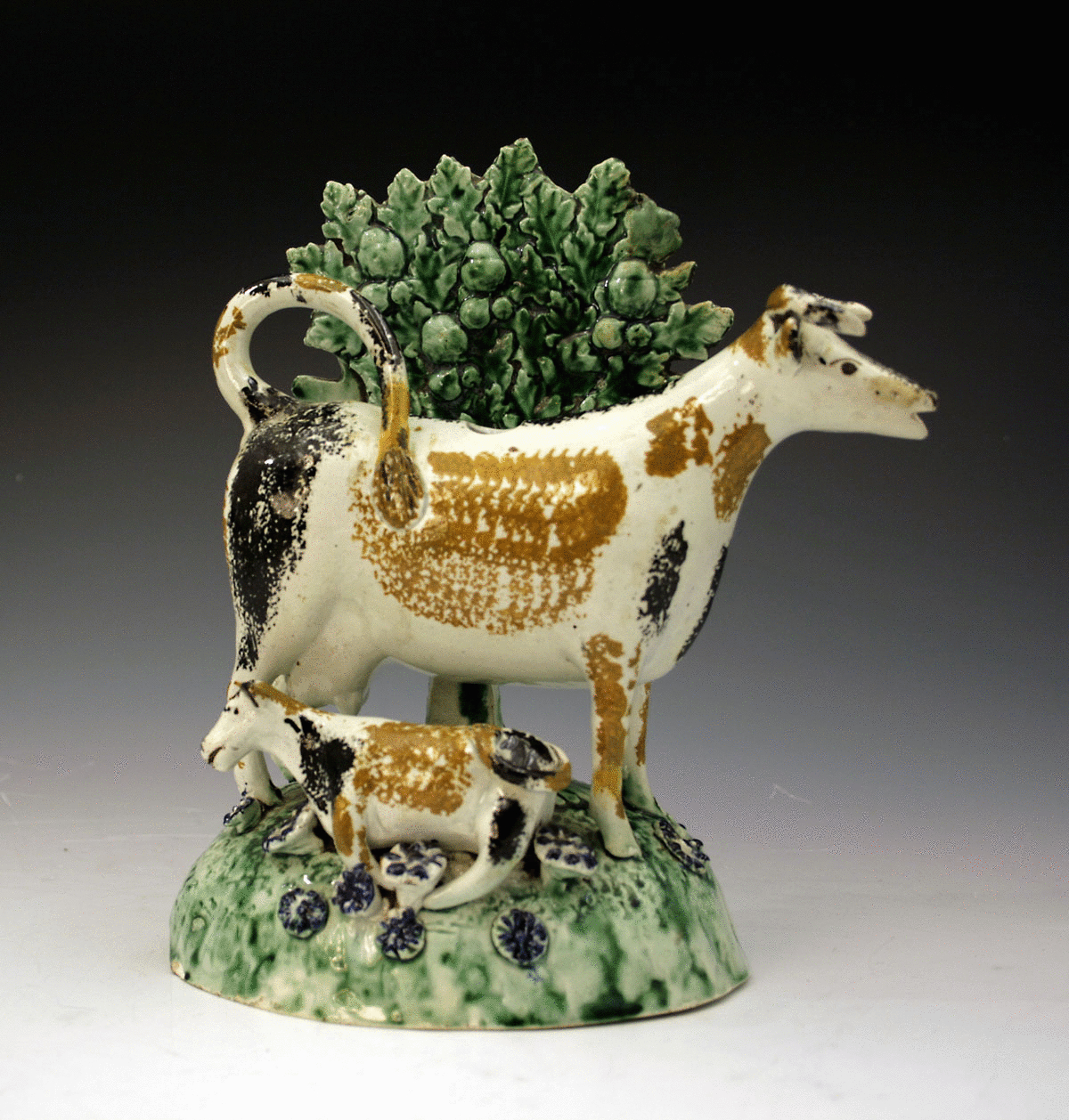 Antique pratt coloured cow creamer with bocage, Staffordshire or Yorkshire c1800