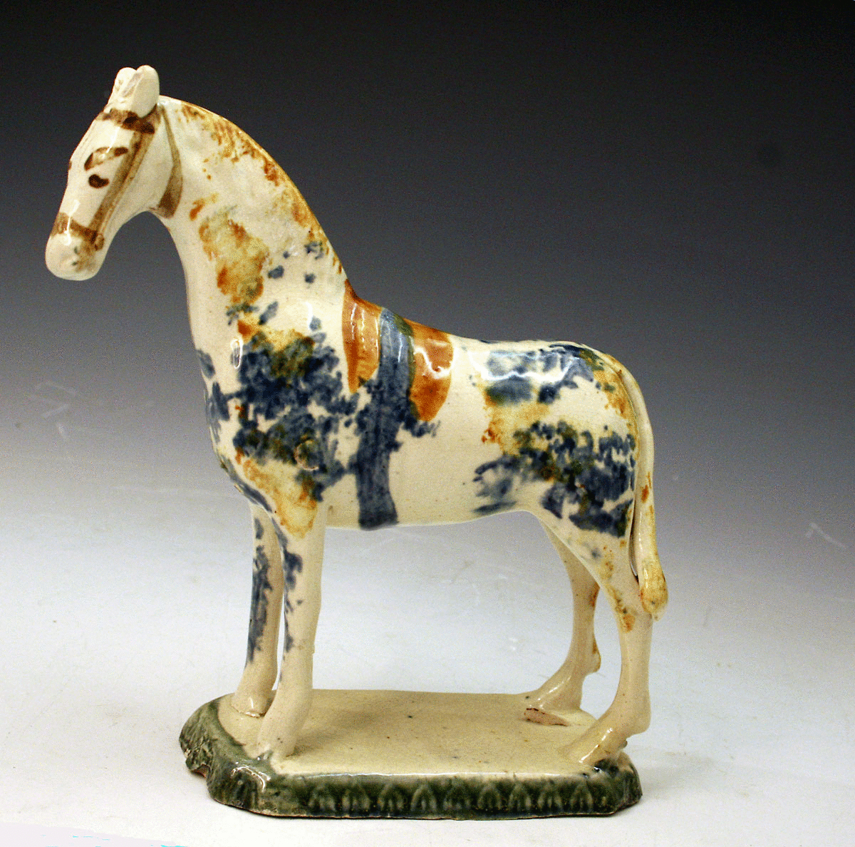 English pottery prattware figure of a standing horse on base c1790
