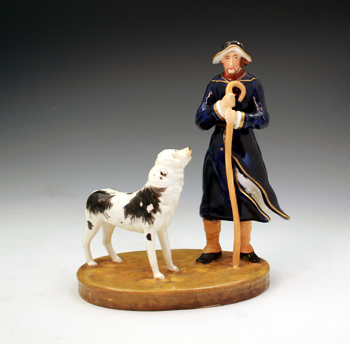 Staffordshire figure of a shepherd and dog circa 1840