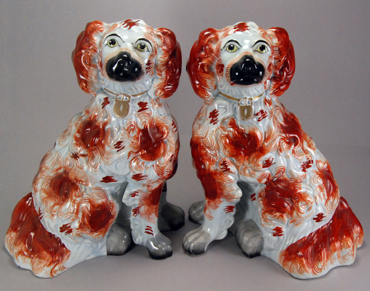 Antique Victorian pair of Staffordshire pottery figures of spaniel dogs