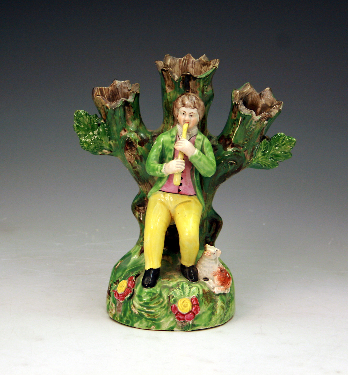 Staffordshire pottery pearlware figure of piping shepherd c1820